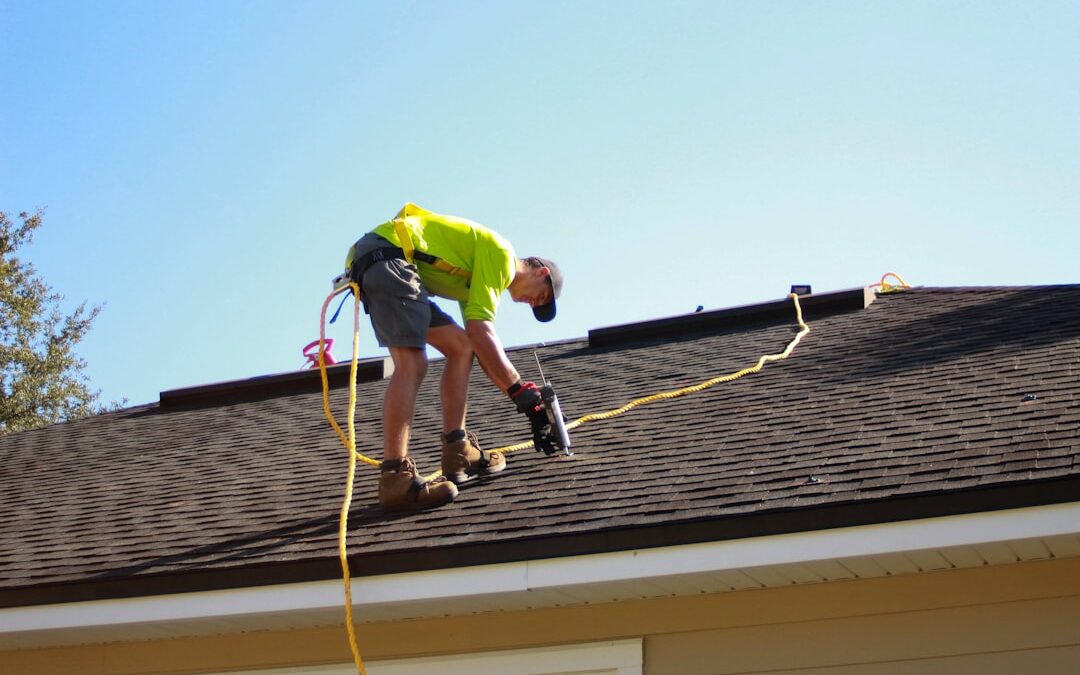 Friendly HVAC technician performing professional maintenance on an outdoor AC unit